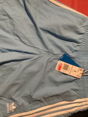 adidas Men’s Sky Blue Athletic Shorts with White Stripe Accents